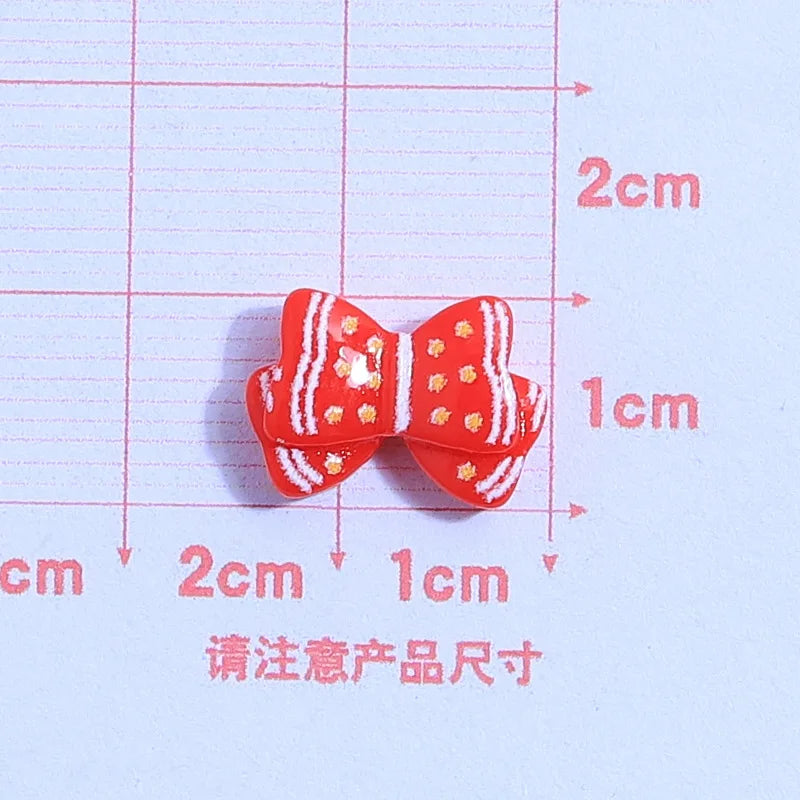 små julfigurer i resin