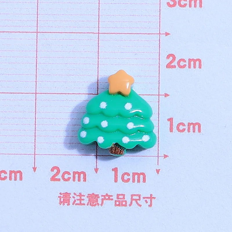 små julfigurer i resin