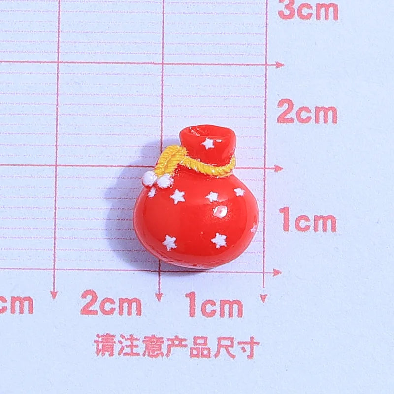 små julfigurer i resin