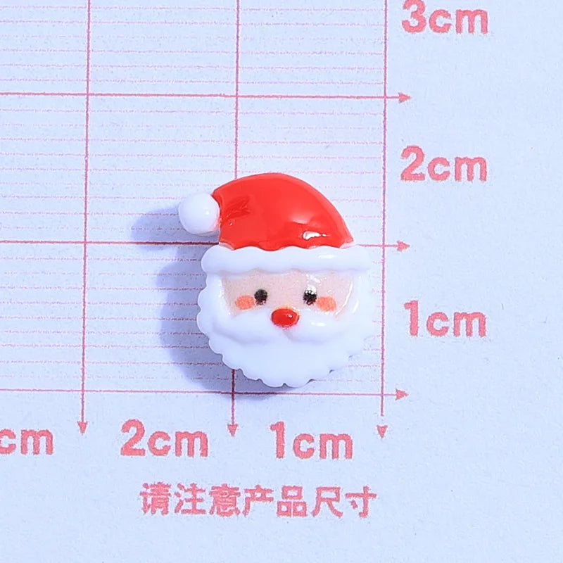 små julfigurer i resin