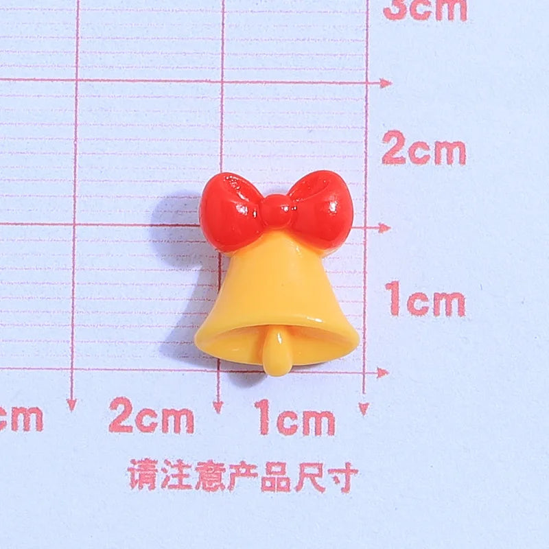 små julfigurer i resin