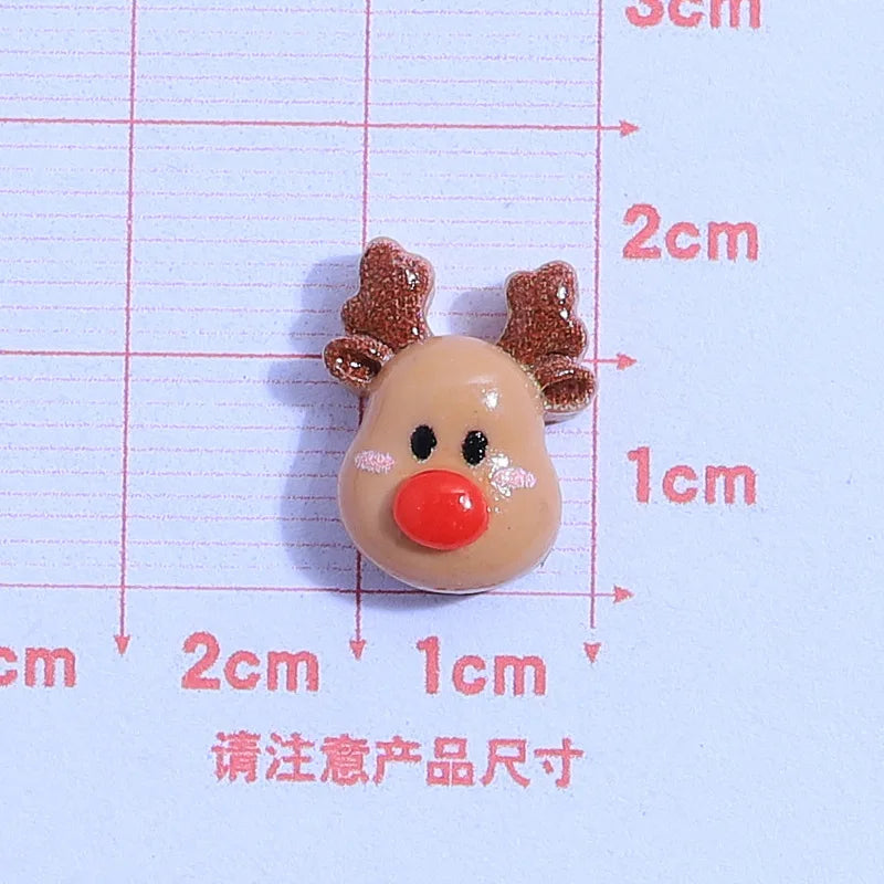 små julfigurer i resin