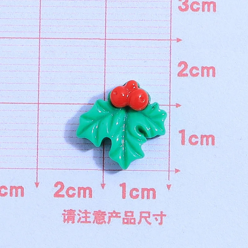 små julfigurer i resin