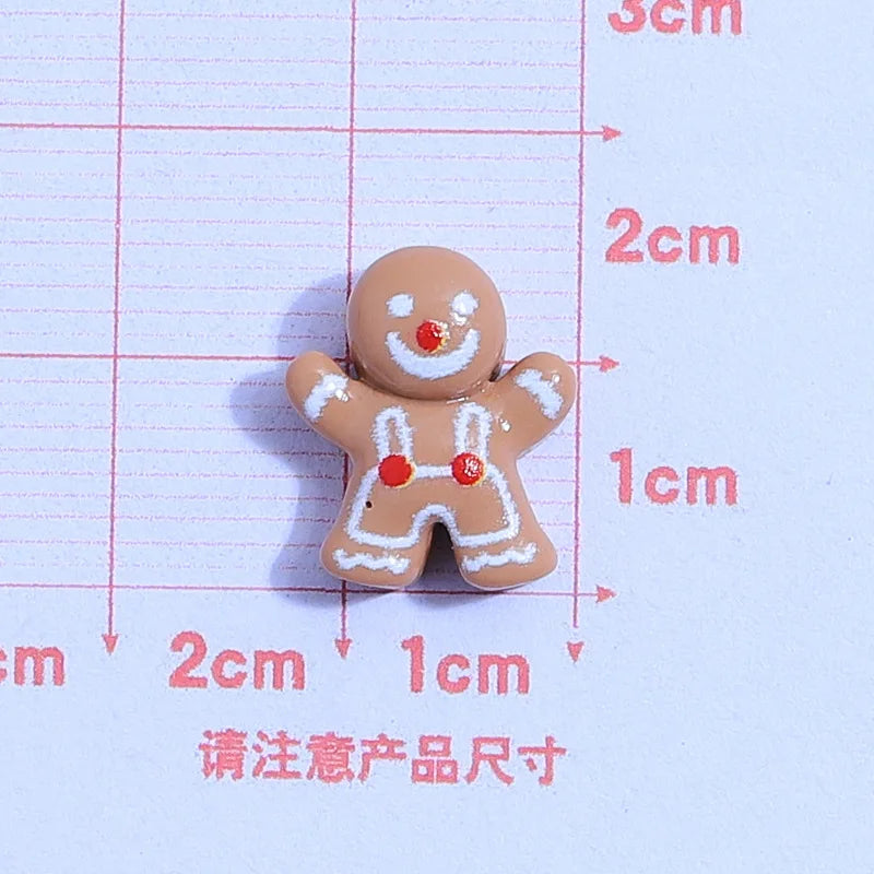 små julfigurer i resin