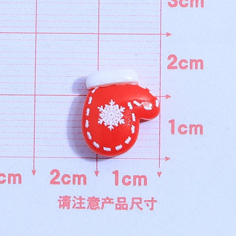 små julfigurer i resin