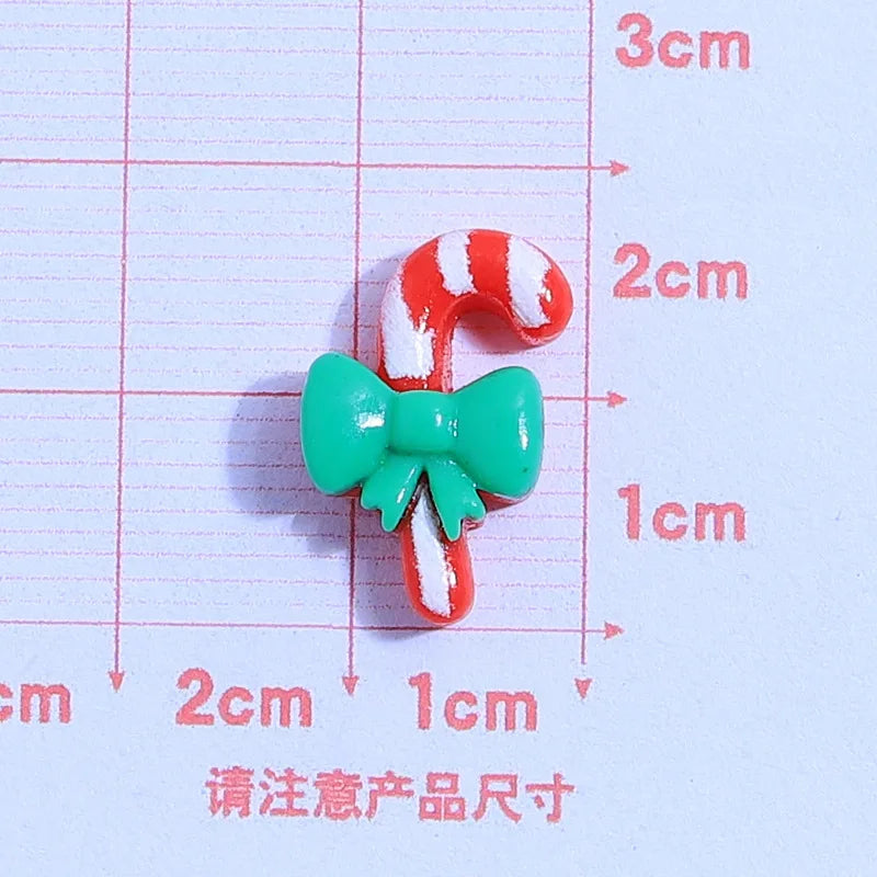 små julfigurer i resin