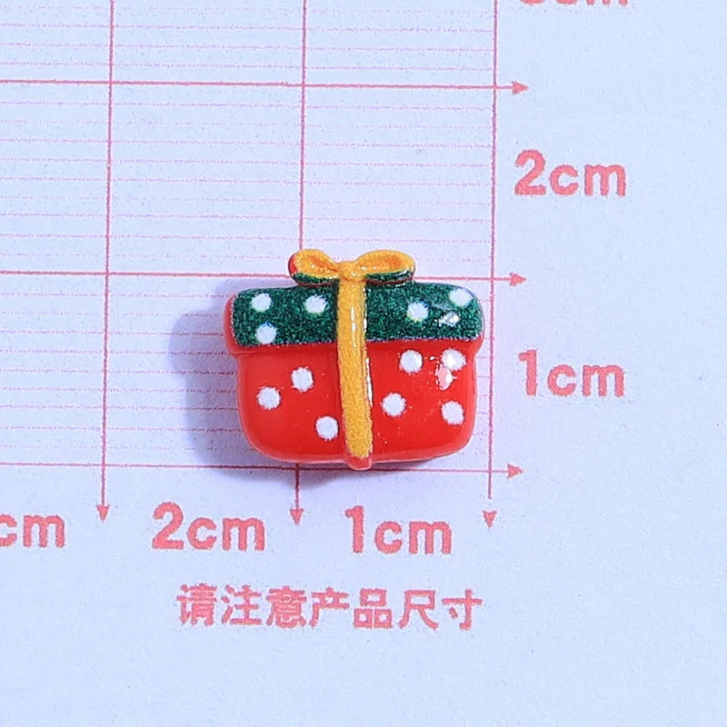 små julfigurer i resin