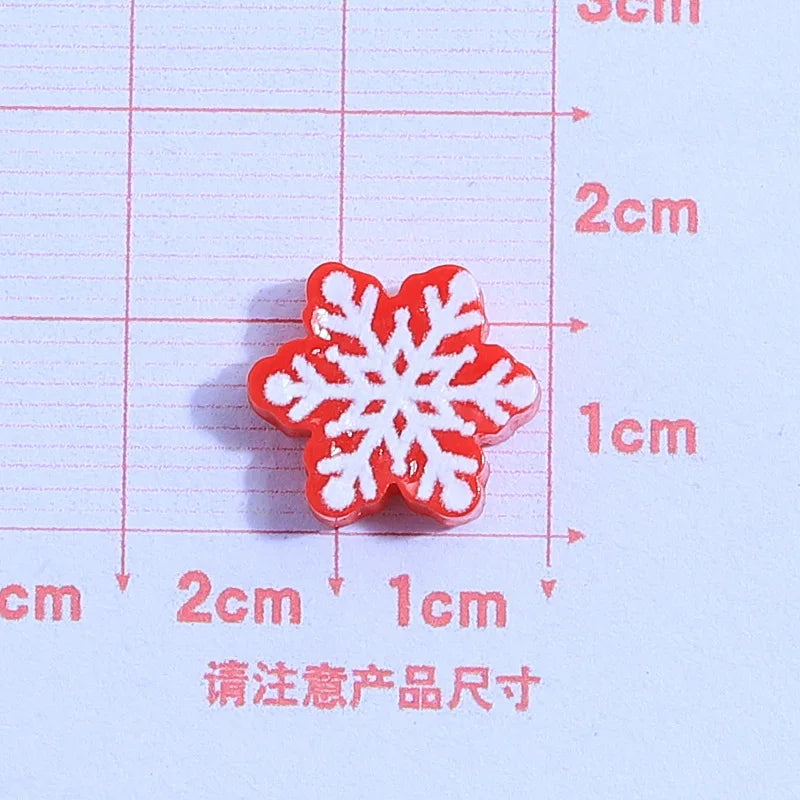 små julfigurer i resin