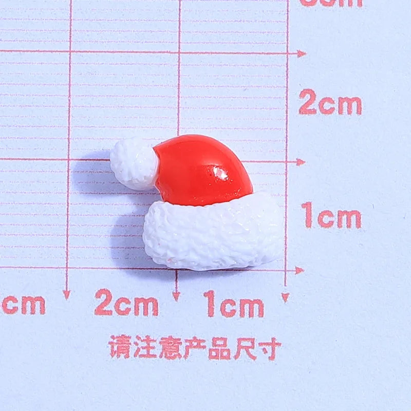 små julfigurer i resin